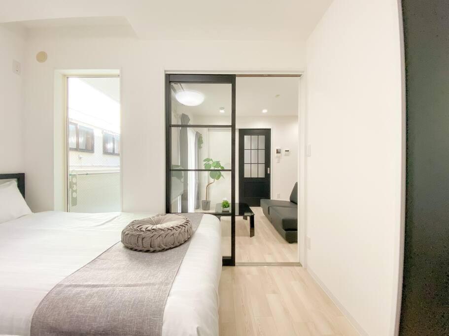 Residential Hotel Glitter Usjまで1駅5分 Осака Номер фото