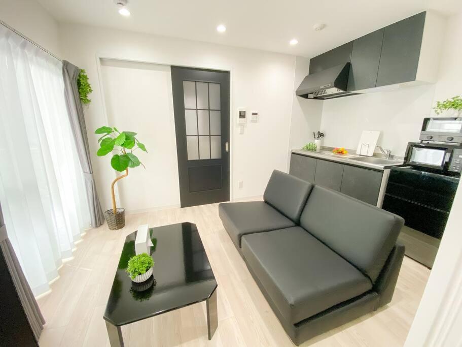 Residential Hotel Glitter Usjまで1駅5分 Осака Номер фото