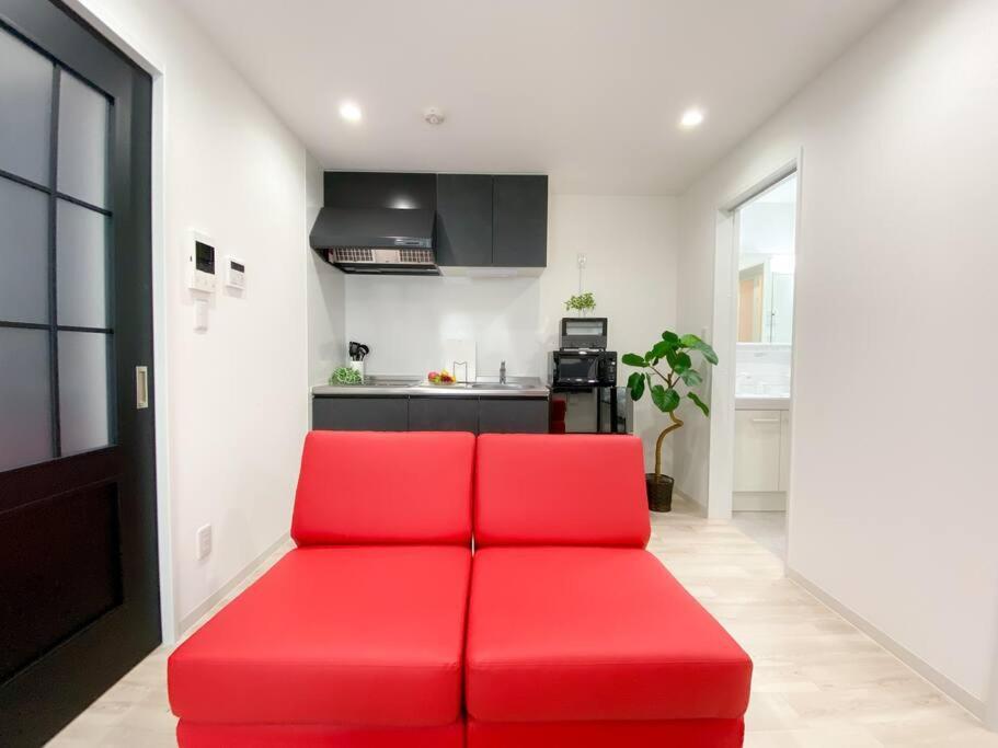 Residential Hotel Glitter Usjまで1駅5分 Осака Номер фото
