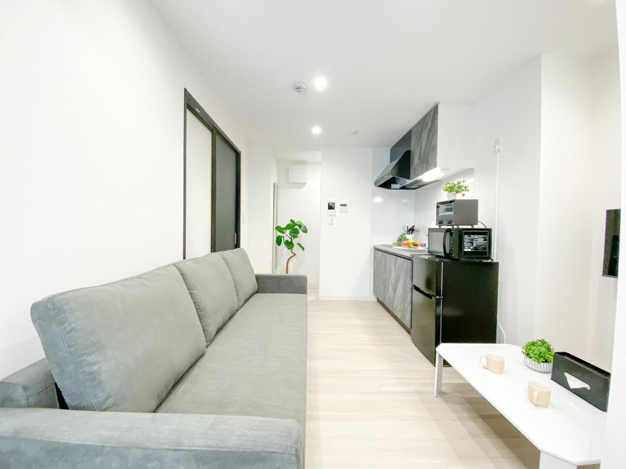 Residential Hotel Glitter Usjまで1駅5分 Осака Номер фото