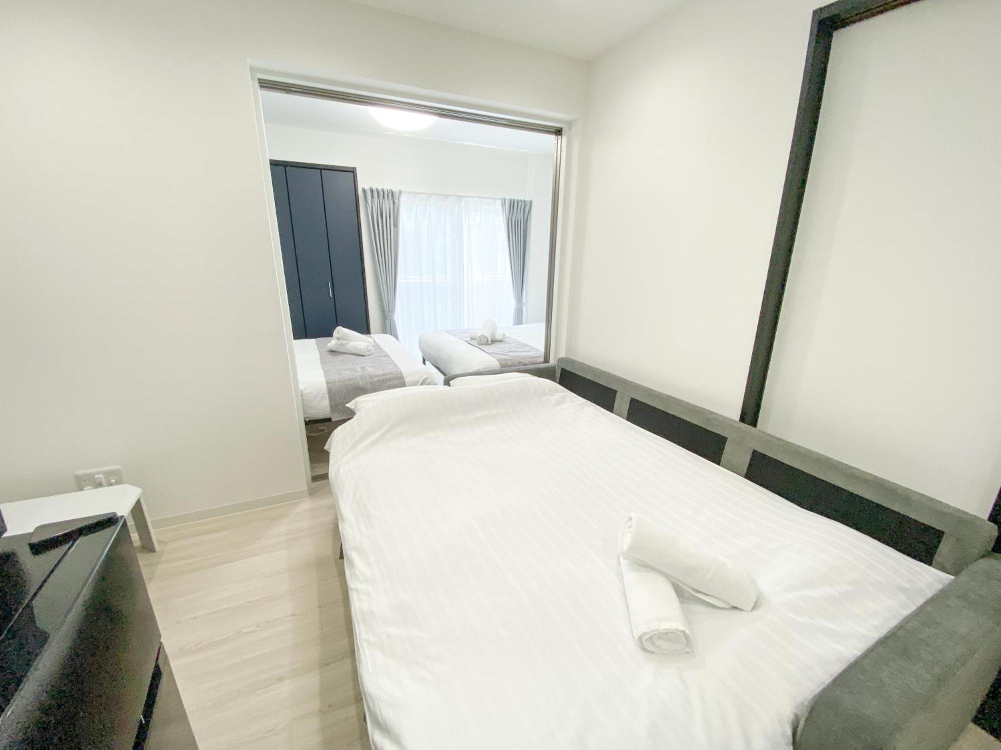 Residential Hotel Glitter Usjまで1駅5分 Осака Номер фото